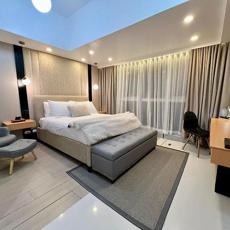 Hotel Vibe Condo At Uptown Parksuites Bgc 达义 外观 照片