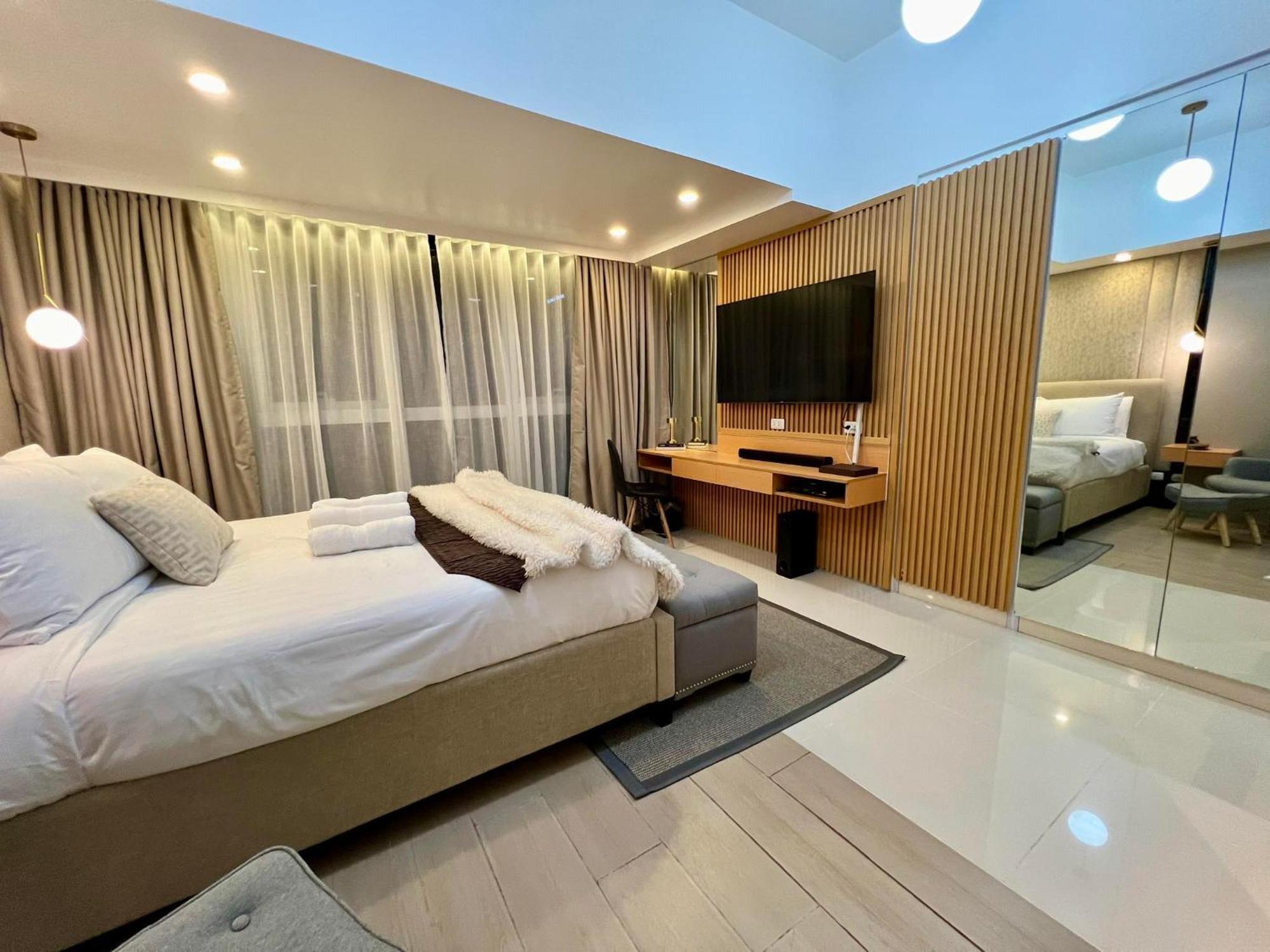 Hotel Vibe Condo At Uptown Parksuites Bgc 达义 外观 照片